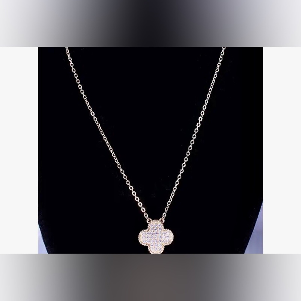 Clover necklace w/ Pave Crystals Set in Goldtone Setting On A Goldtone Chain.